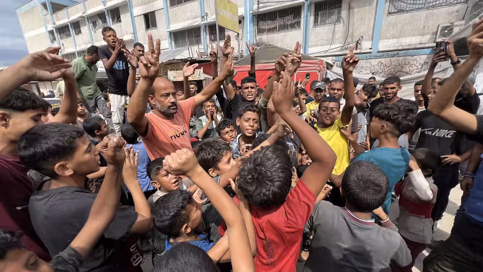 Israel and Hamas will exchange hostages and prisoners after agreeing to a pause in the war in Gaza